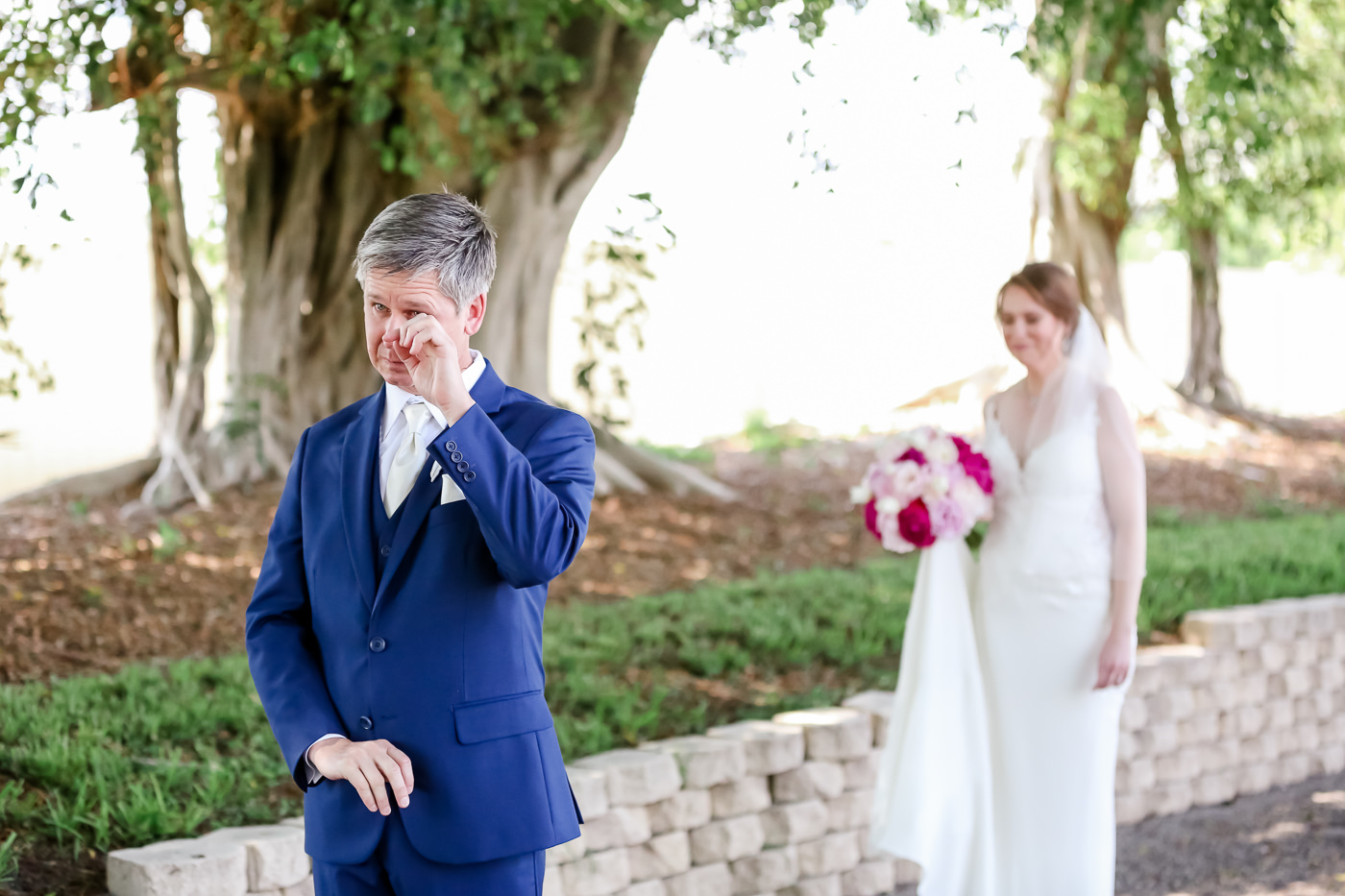 Emotional Groom During First Look Wedding Portrait in Blue Suit and White Tie | Tampa Bay Wedding Photographer Lifelong Photography Studios