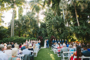 Tropical Garden-Themed Wedding Ceremony Portrait of Bride and Groom Exchanging Vows | Tampa Bay Wedding Photographer Kera Photography | St. Petersburg Wedding Venue Sunken Gardens