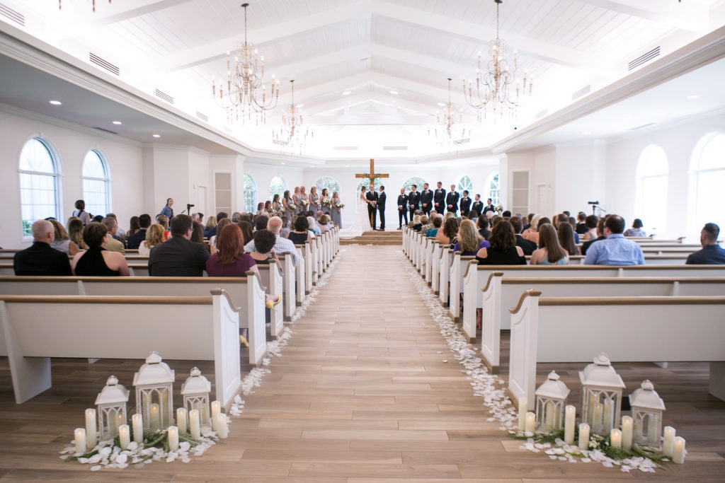 Traditional Church Wedding Ceremony Bride and Groom Exchanging Vows Portrait | Tampa Bay Wedding Photographer Carrie Wildes Photography | Safety Harbor Wedding Venue Harborside Chapel | Wedding Planner Love Lee Lane