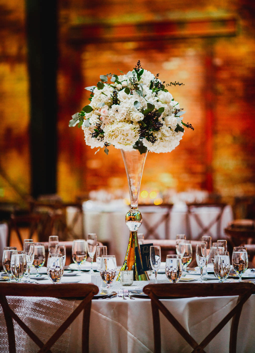 Classic, Tall Floral Centerpieces with White, Blush Pink, Navy and Ivory Flowers with Greenery, on Towering Crystal Vase | Tampa Bay Luxury Wedding Planner Coastal Coordinating