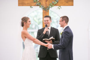 Classic Bride and Groom Exchanging Wedding Vows During Traditional Church Ceremony | Tampa Bay Wedding Photographer Carrie Wildes Photography | Safety Harbor Wedding Venue Harborside Chapel