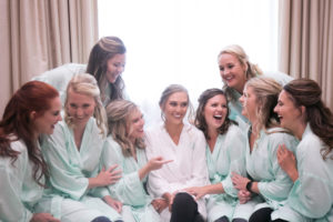 Fun Bride and Bridesmaids in Mint Robes Getting Wedding Ready Portrait | Tampa Bay Wedding Photographer Carrie Wildes Photography