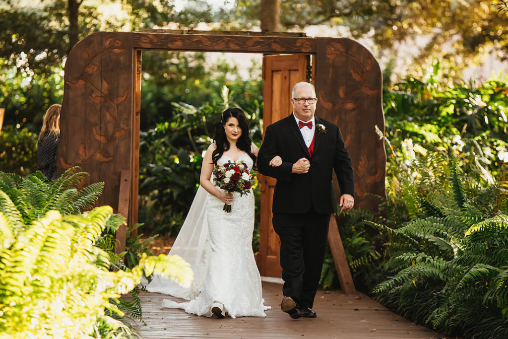 Bride Walking Down Aisle with Father Outdoor Rustic Wedding Wood Doors Fall Winter Red