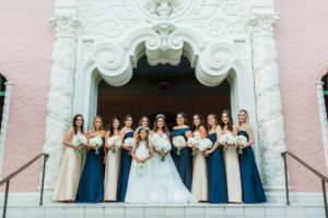 St. Pete Bride in Hayley Paige Wedding Dress, Bridesmaids in Mix and Match Navy Blue and Gold Dresses, Flower Girl in White Dress Bridal Party Portrait