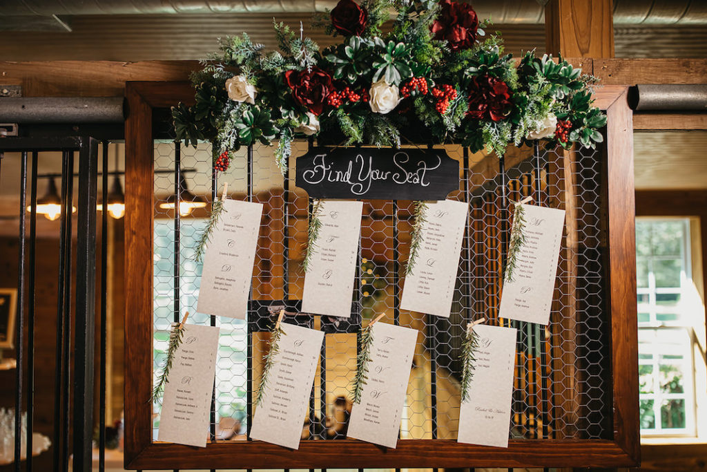 Rustic Country Fall Winter Wedding Seating Chart with Chicken Wire Clothespin Pine | Red White Greenery Roses