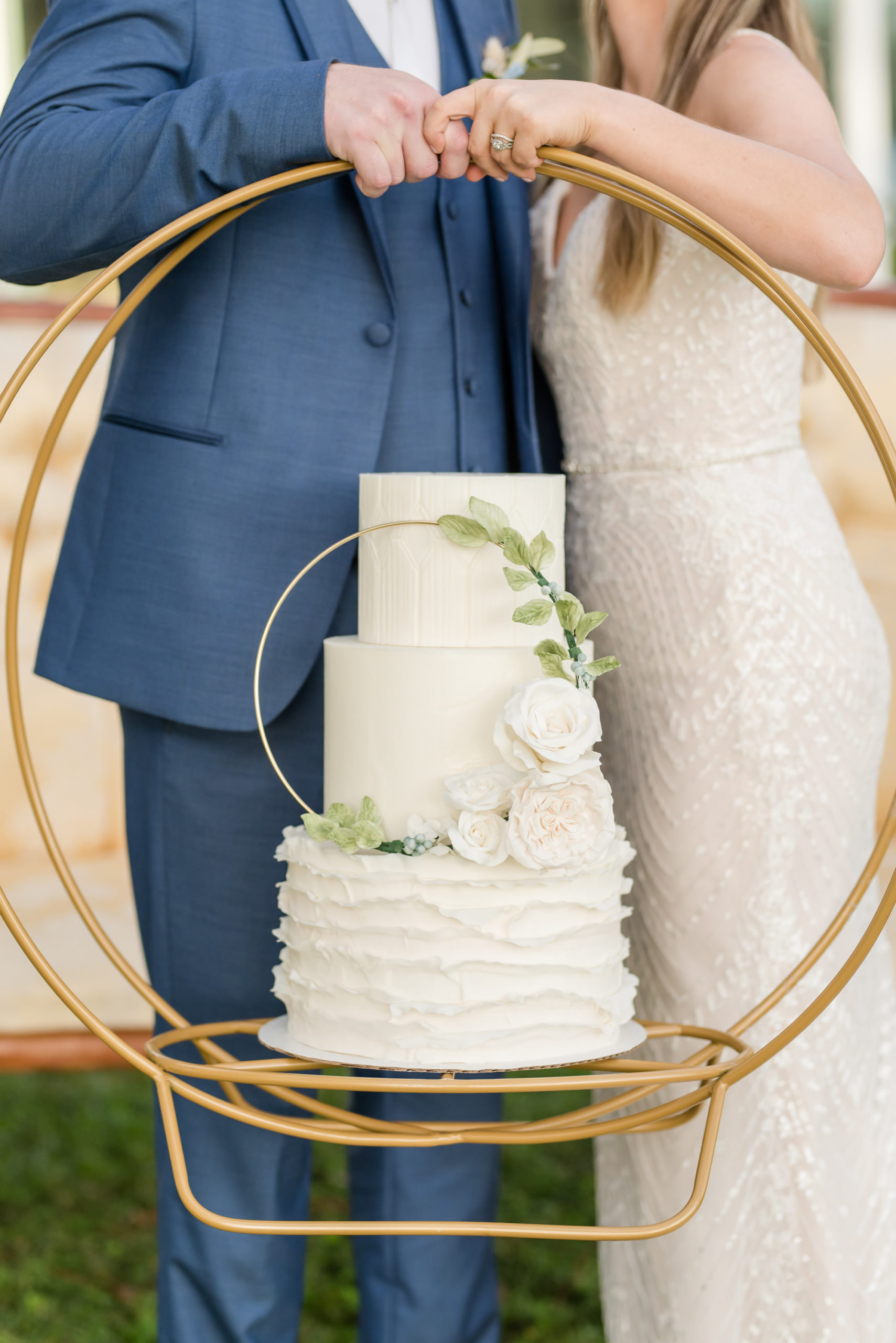 Dusty Rose Styled Wedding Shoot, Round Gold Hoop Wedding Cake Stand with Three Tier Classic Modern Wedding Cake with Ruffled Bottom Tier, Gold Circle with Green Leaves and Roses | Tampa Bay Wedding Planner Elegant Affairs by Design | Wedding Baker Tampa Bay Cake Company