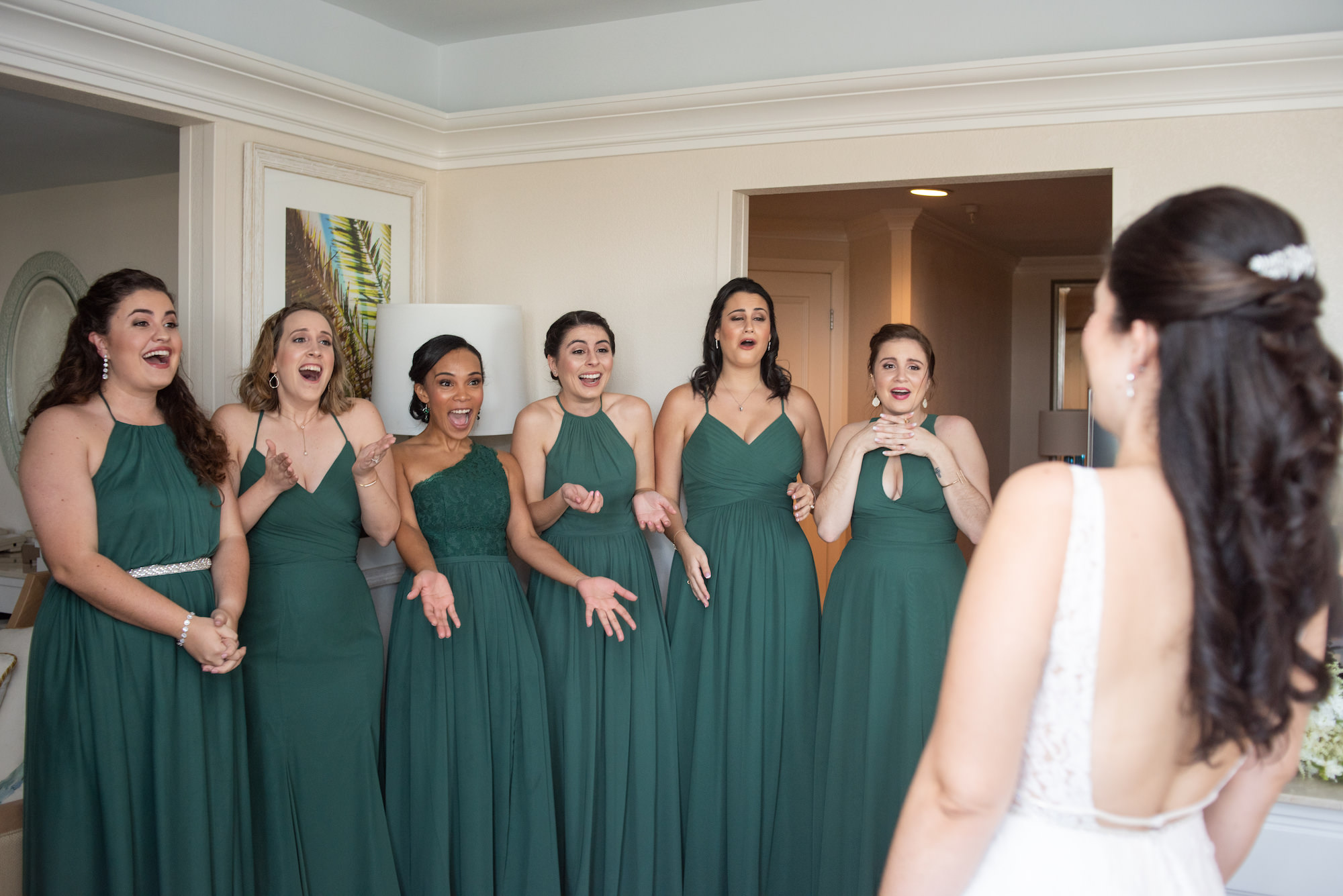 First Look Wedding Portrait with Bride and Bridesmaids in Dark Green Mix and Match Azazie Dresses