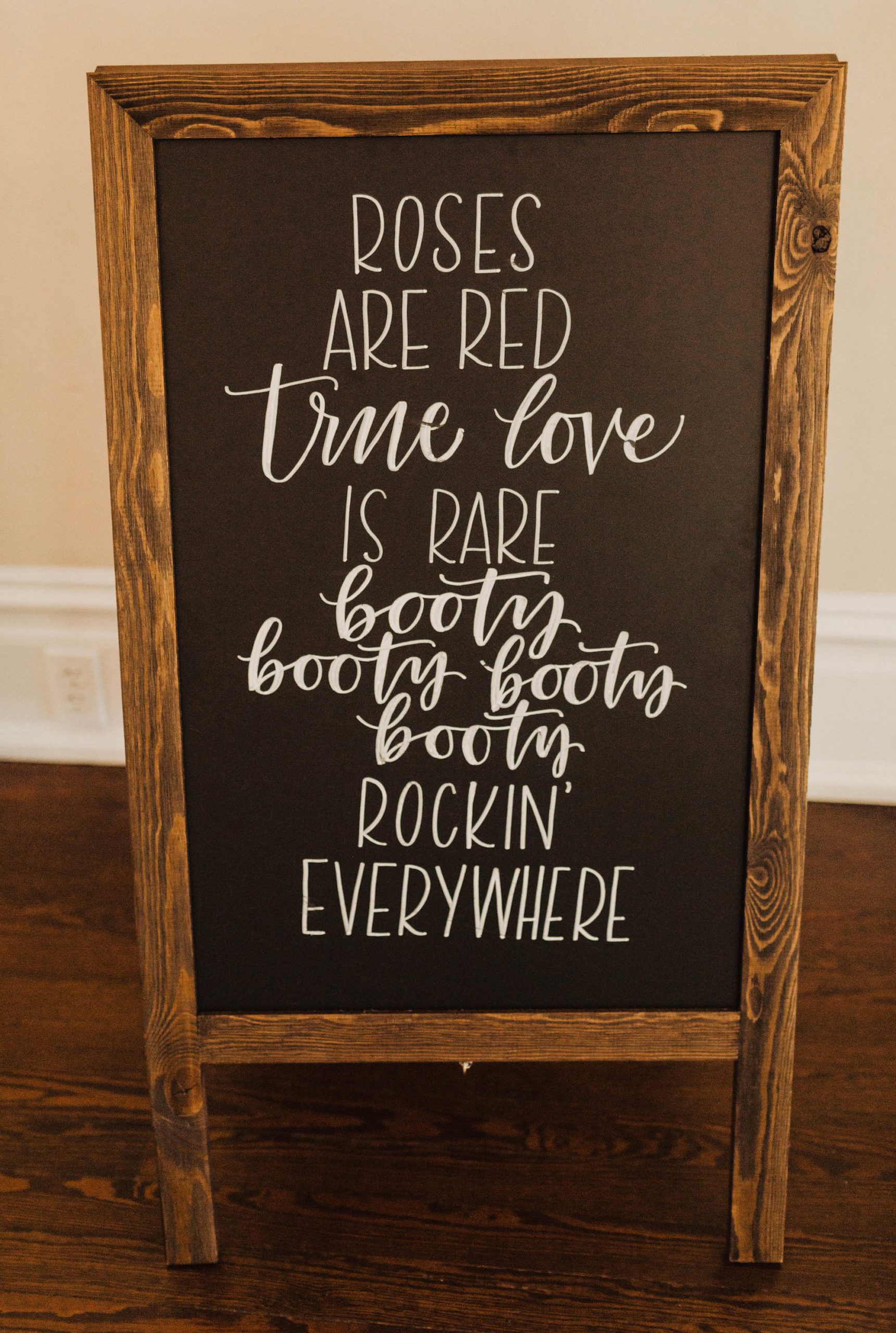 Rustic Wood and Chalkboard Signage with White Font