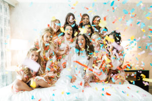 Tampa Bride and Bridesmaids in Floral Robes Fun Colorful Confetti Getting Wedding Ready Portrait