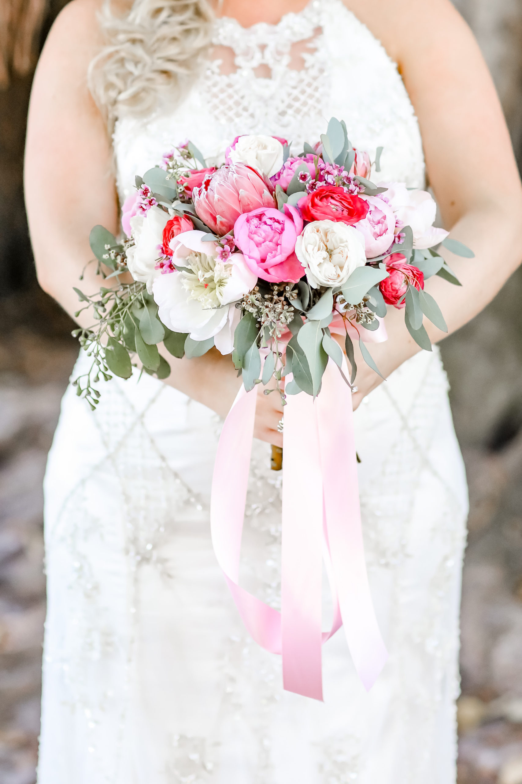 Florida Bride holding Elegant Bridal Bouquet, Ivory, White, Pink and Red Florals, Dusty Rose Accent Ribbon with Greenery | Florida Wedding Photographer Lifelong Photography Studios