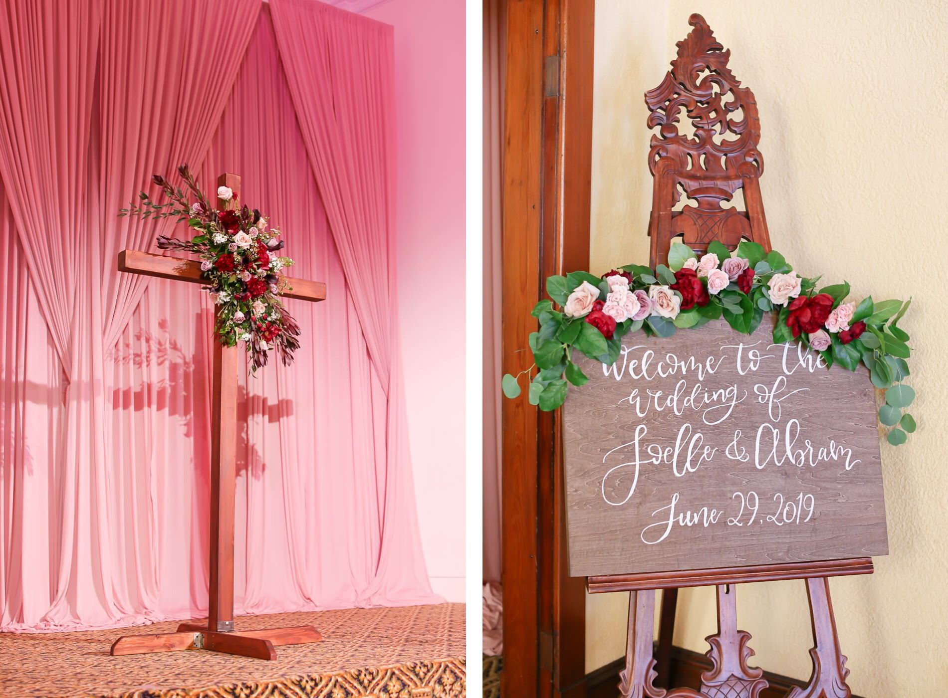 Romantic Religious Wedding Ceremony Decor, Wooden Cross with Flower Arrangement, Wooden Welcome Sign with Red and Blush Pink Roses, Greenery Leaves Garland | Wedding Photographer Lifelong Photography Studios | Tampa Bay Wedding Planner Blue Skies Weddings and Events | St. Petersburg Wedding Venue Bridgepoint Church | Dusty Rose Draping Gabro Event Services
