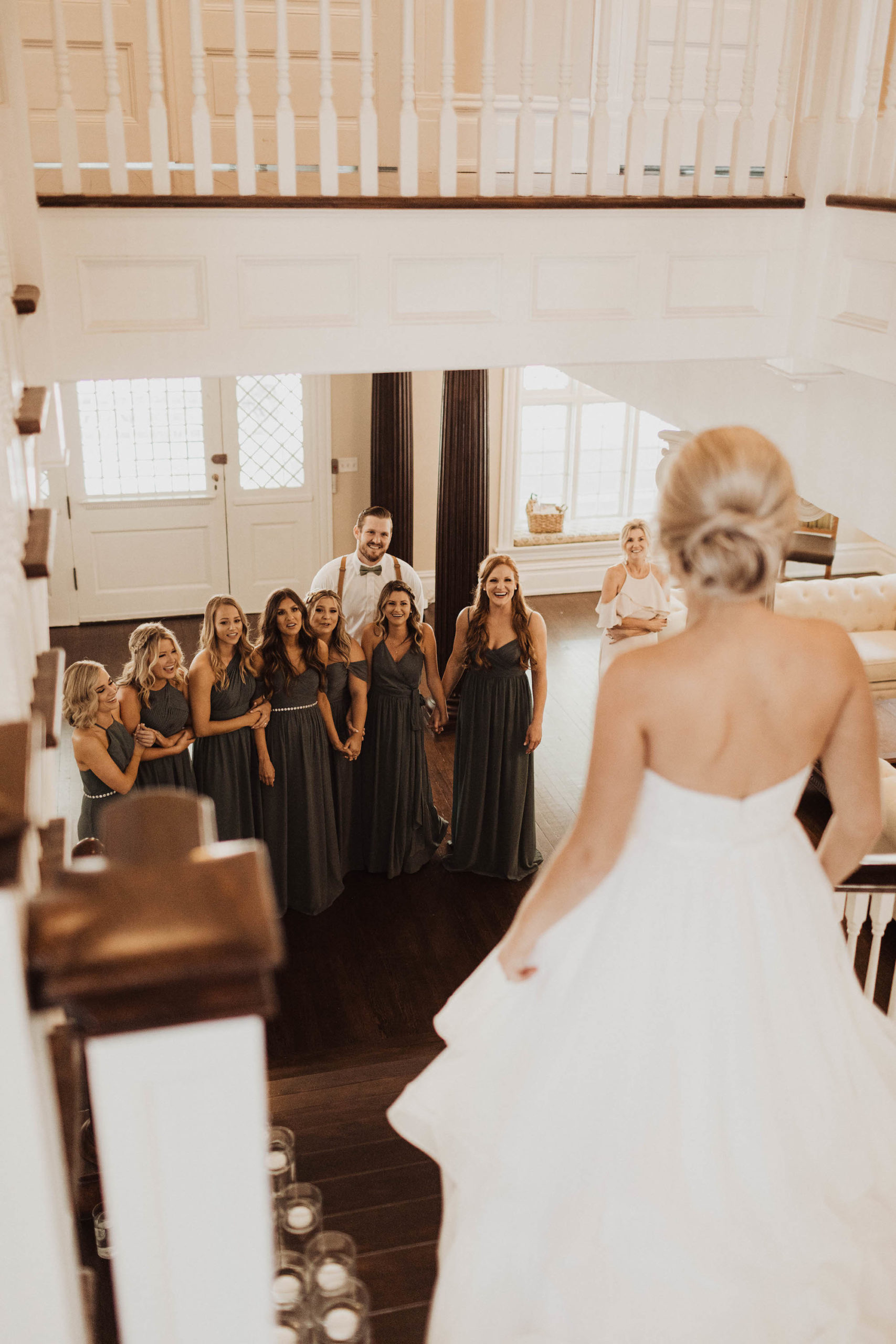 Tampa Bay Bridal Party First Look Wedding Portrait with Bride, Bridesmaids Wearing Mix and Match Green Dresses