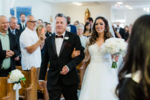 Tampa Bay Bride and Father Processional Walking Down the Wedding Ceremony Aisle Portrait