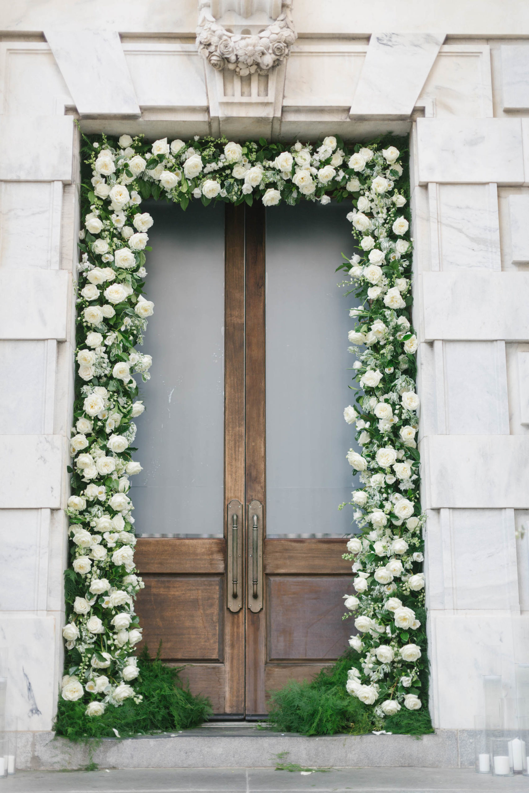 Romantic Garden Inspired Wedding Ceremony Decor, Greenery and White Roses Doorway Arch | Tampa Wedding Planner Parties A'la Carte