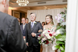 Tampa Bay Bride and Father Walk Down the Aisle Portrait, Bride Holding Romantic Floral Wedding Bouquet with Red, White and Mauve Roses, Purple Flowers with Greenery and Eucalyptus | Downtown St. Pete Wedding Planner Blue Skies Weddings and Events | Florida Wedding Photographer Lifelong Photography Studio