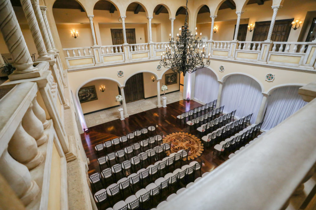 Tampa Wedding Venue Avila Golf & Country Club | Indoor Ceremony with Chiavari Chairs and Chandelier