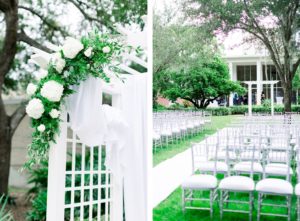 Garden-Glam Outdoor Wedding Ceremony Arbor Arch with White Draping, Hydrangeas, Roses and Greenery Floral Arrangements and Aisle Runner, Silver Chiavari Chairs | Wedding Venue Tampa Garden Club | Wedding Photographer Shauna and Jordon Photography