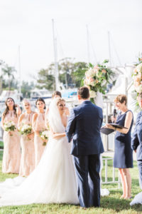 Peach, Pink, and White Tropical Wedding Ceremony Arch Decor with Greenery | Sarasota Wedding Officiant A Wedding with Grace