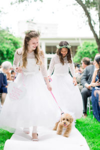 Flower Girls in Matching Lace and Tulle Dresses with Greenery Floral Crowns Walking with Poodle Dog | Wedding Venue Tampa Garden Club | Wedding Photographer Shauna and Jordon Photography | Pet Planner FairyTail Pet Care