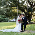 Bride and Groom Sunset Wedding Portrait on Outdoor Swing | Wedding Photographer Lifelong Photography Studio | Wedding Planner Blues Skies Weddings and Events | Tampa Wedding Venue Davis Islands Garden Club