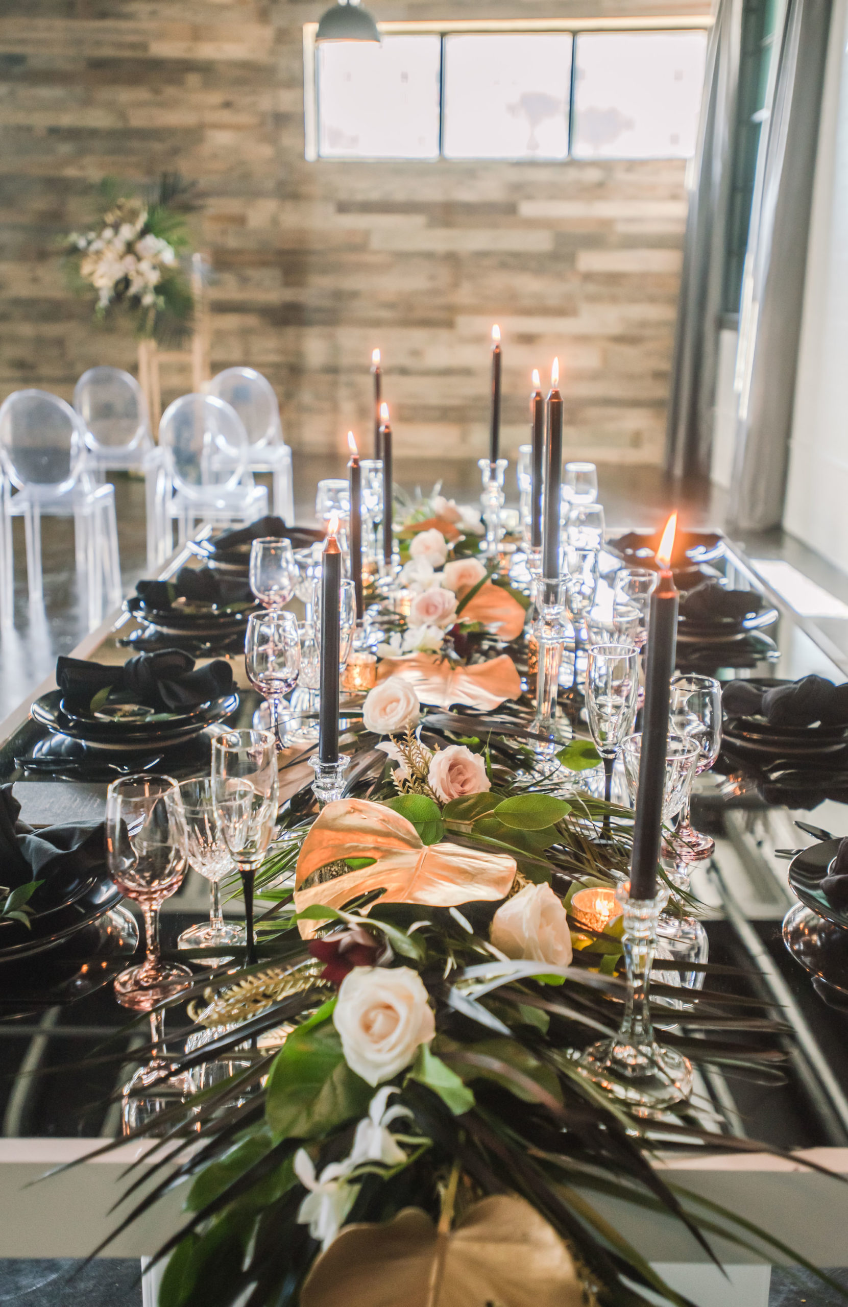 Dark Luxe, Romantic Wedding Reception Styled Shoot Decor, Long Table with Palm Fronds, Gold Painted Monstera Leaves, Blush Pink Roses Table Runner, Black Candlesticks and Tableware Plates | Tampa Bay Wedding Planner Elegant Affairs by Design