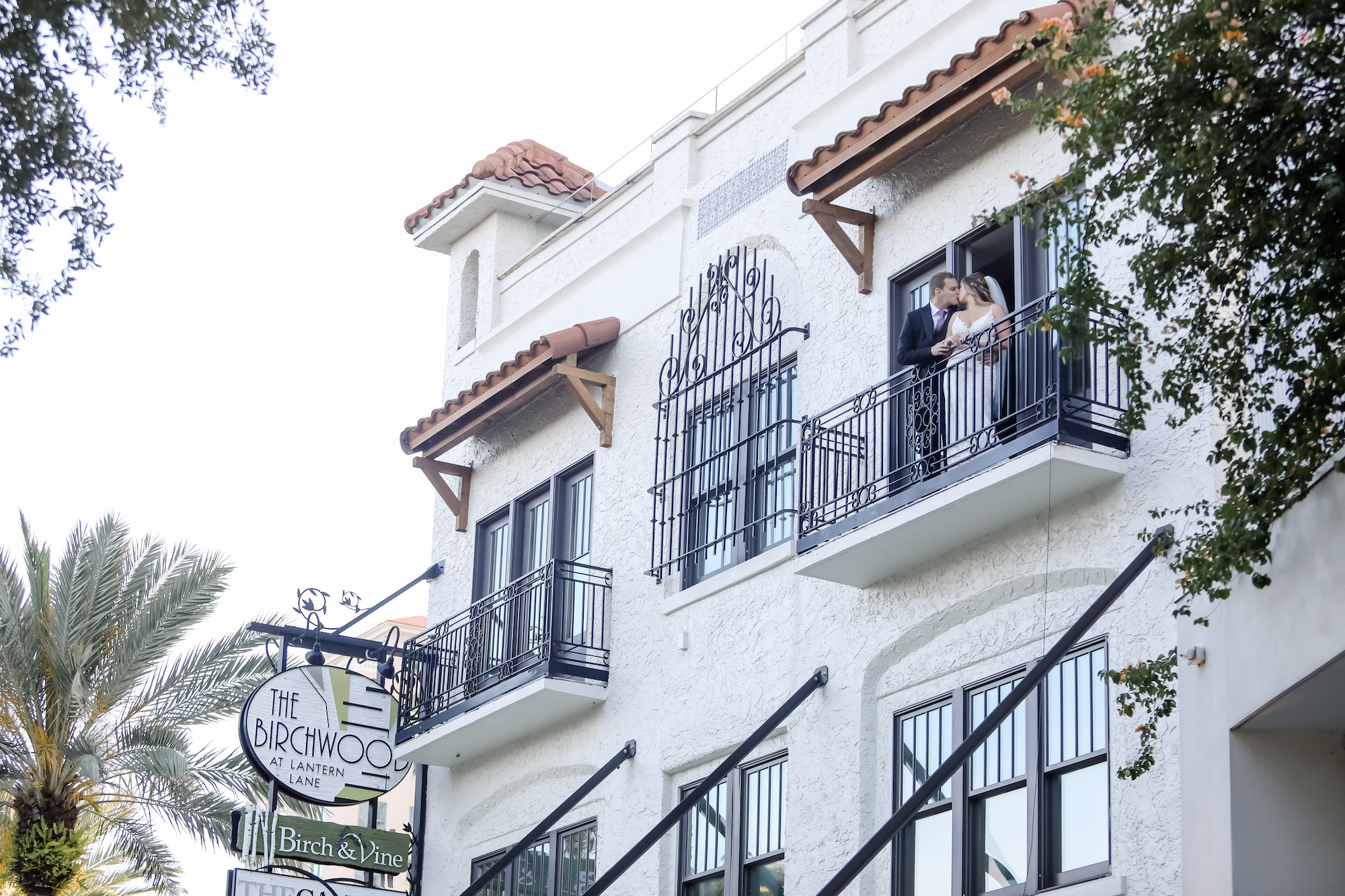 Florida Bride and Groom Wedding Portrait on Balcony in Downtown St. Pete | Tampa Bay Boutique Hotel Wedding Venue The Birchwood | Florida Wedding Photographer Lifelong Photography Studio