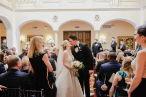 Tampa Wedding Venue Avila Golf & Country Club | Indoor Ceremony | Bride and Groom First Kiss
