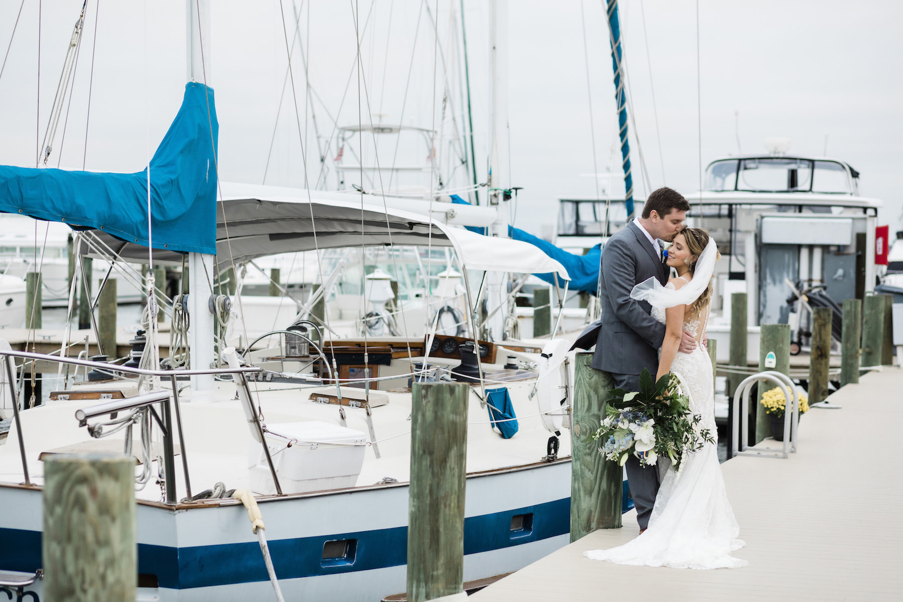 Bride and Groom Portraits at Marina Dock by Boats | St. Pete Wedding Venue Isla Del Sol