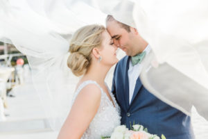 Destination Florida Bride and Groom Wedding Portrait with Flying Veil
