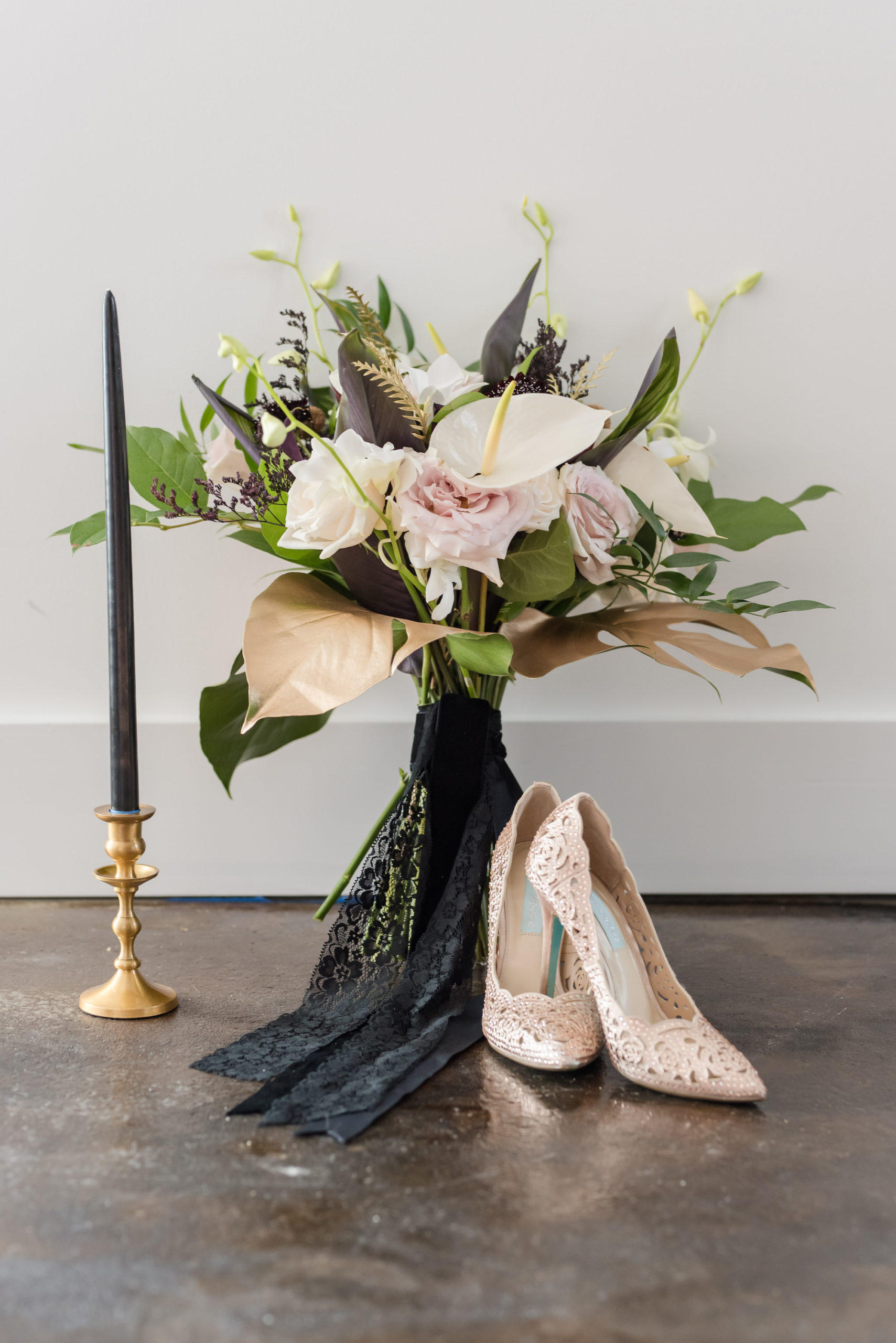 Dark Luxe Style Shoot, White Calla Lily, Blush Pink Roses, Greenery and Gold Tropical Palm Leaves, Black Candlestick on Gold Stand, Rose Gold Pointed Toe Wedding Shoes | Tampa Bay Wedding Planner Elegant Affairs by Design