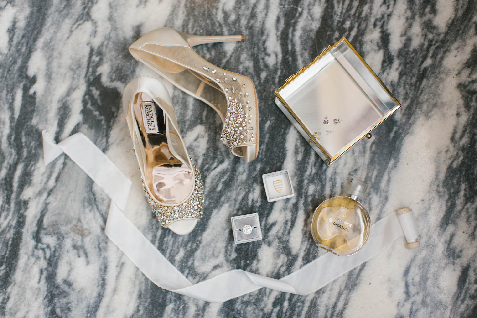 Elegant Wedding Accessories, Bride's Badgley Mischka Ivory, Illusion with Rhinestones Peep Toe Wedding Shoes, Round Diamond Engagement Ring, Perfume Bottle and Clear and Gold Rimmed Jewelry Box