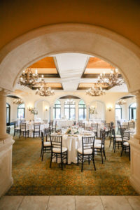 Tampa Wedding Venue Avila Golf & Country Club | Indoor Ballroom Reception with Black Chiavari Chairs and Chandeliers