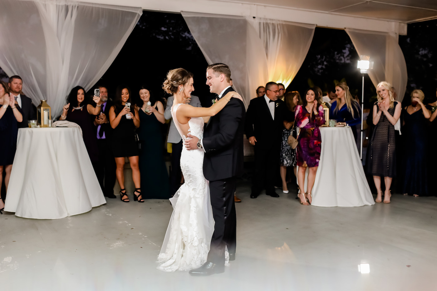 Classic Bride and Groom First Dance Wedding Reception Portrait, White Draping and White Dance Floor | Wedding Photographer Lifelong Photography Studio | Wedding Rentals and Lighting Gabro Event Services | Tampa Bay Wedding Planner Blue Skies Weddings and Events