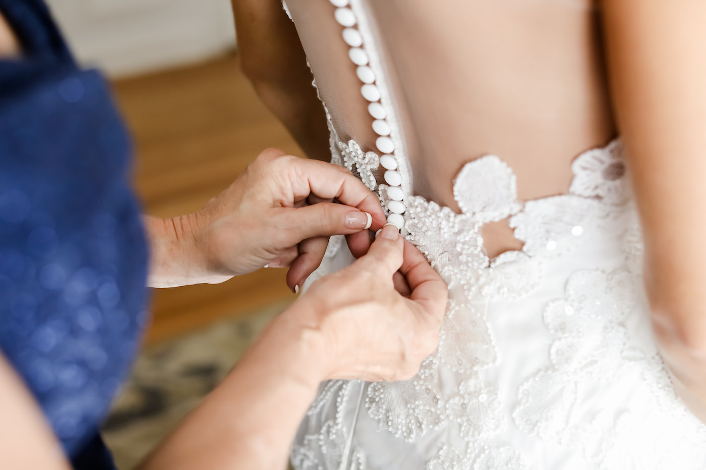 Tampa Bride Getting Ready in Button Down Wedding Dress | Wedding Photographer Lifelong Photography Studio
