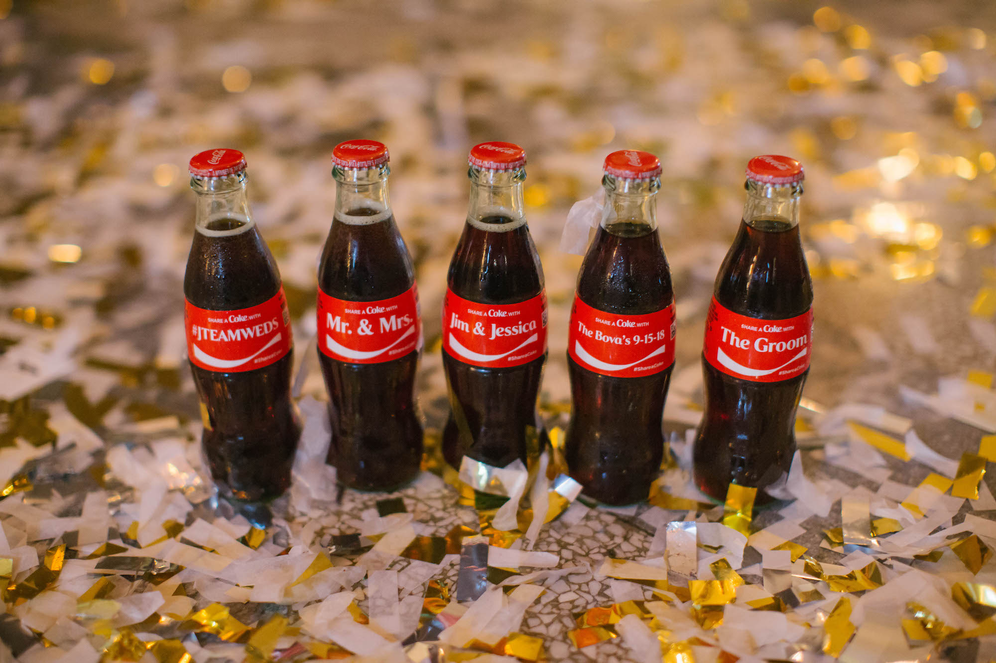 Fun Creative Custom Coca-Cola Bottles on Gold Confetti Portrait | Tampa Bay Wedding Planner Parties A'la Carte
