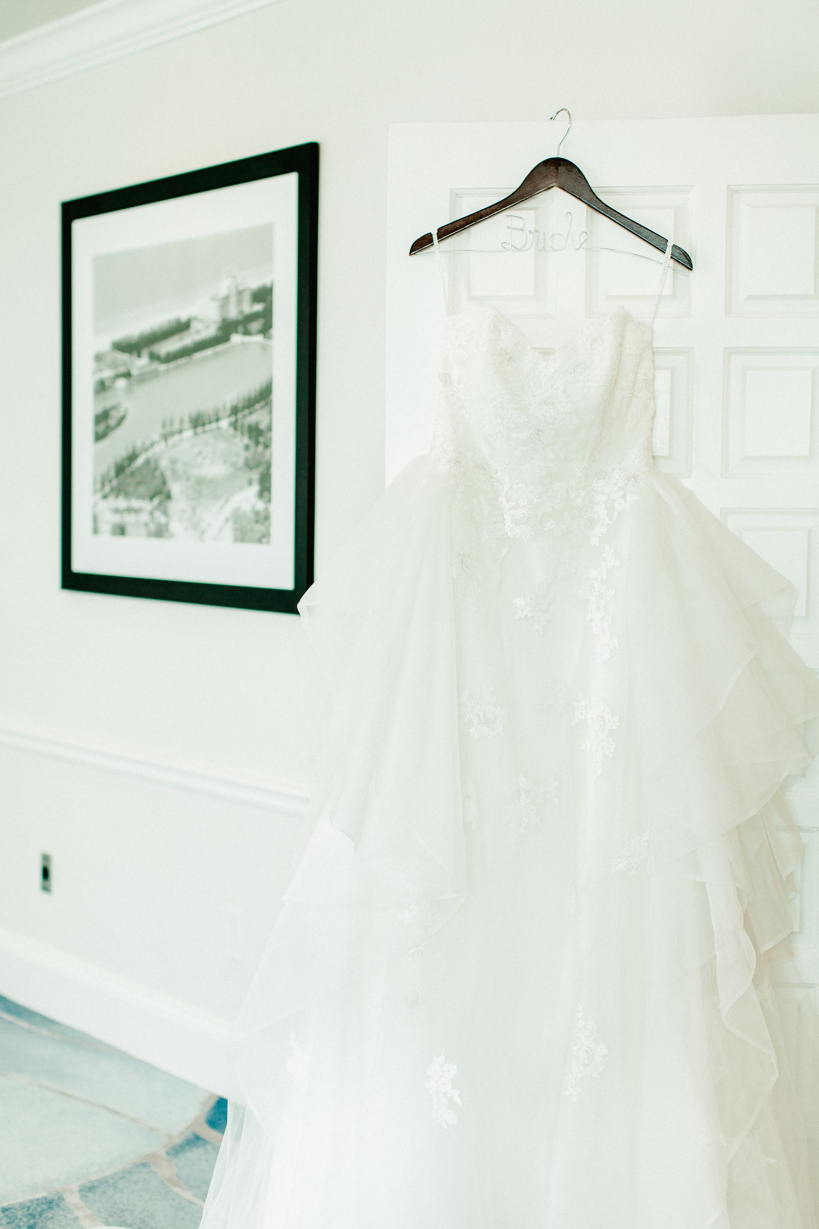 Wedding Dress Bride Hanger Shot | Strapless Lace Sweetheart Tulle Organza Tiered Ballgown | Ivory Bridal Gown | Tampa Luxury Wedding Dress Boutique Isabel O'Neil Bridal Collection