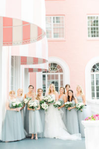 Ivory Bridal Gown Strapless Lace Sweetheart Tulle Organza Tiered Ballgown Wedding Dress | Dusty Blue Grey Tulle Bridesmaid Dresses | St Pete Beach Wedding Venue The Don Cesar | Classic Greenery White Flowers Bouquets | Isabel O'Neil Bridal Collection | Bella Bridesmaids
