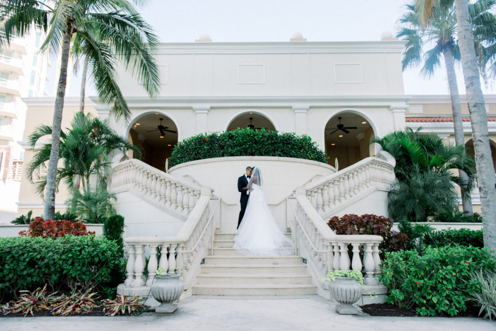 Classic Bride and Groom Wedding Portrait on Staircase of Hotel Wedding Venue Ritz Carlton Sarasota