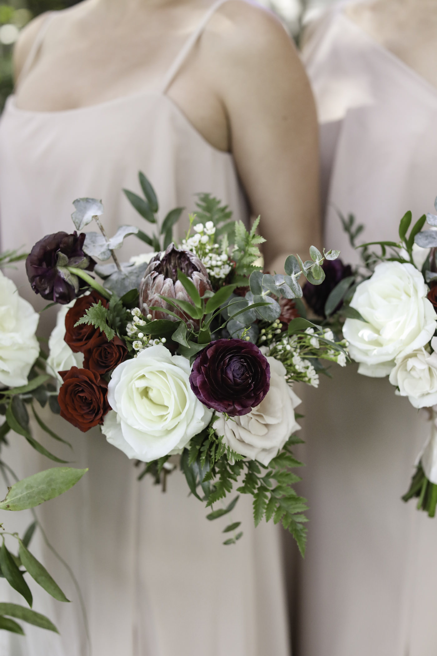 Bridesmaids in Neutral Nude Dress Holding Dark Purple, White and Red Roses with Greenery Floral Bouquet | Wedding Photographer Lifelong Photography Studio | Tampa Bay Wedding Planner Blue Skies Weddings and Events