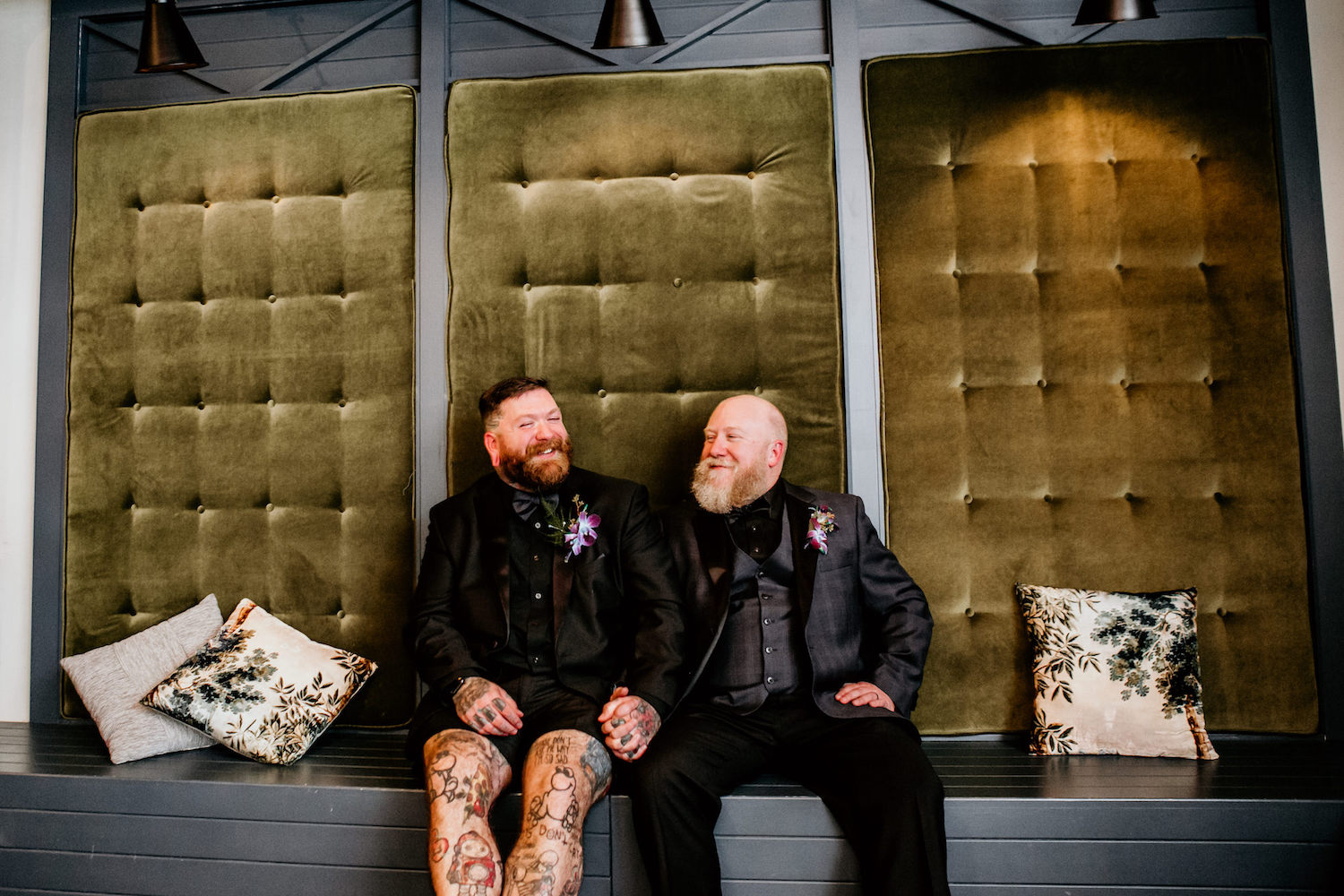 Same Sex Tampa Gay Grooms in Tuxedo and Shorts with Tattoos Wedding Portrait | St. Pete Unique Wedding Venue Station House
