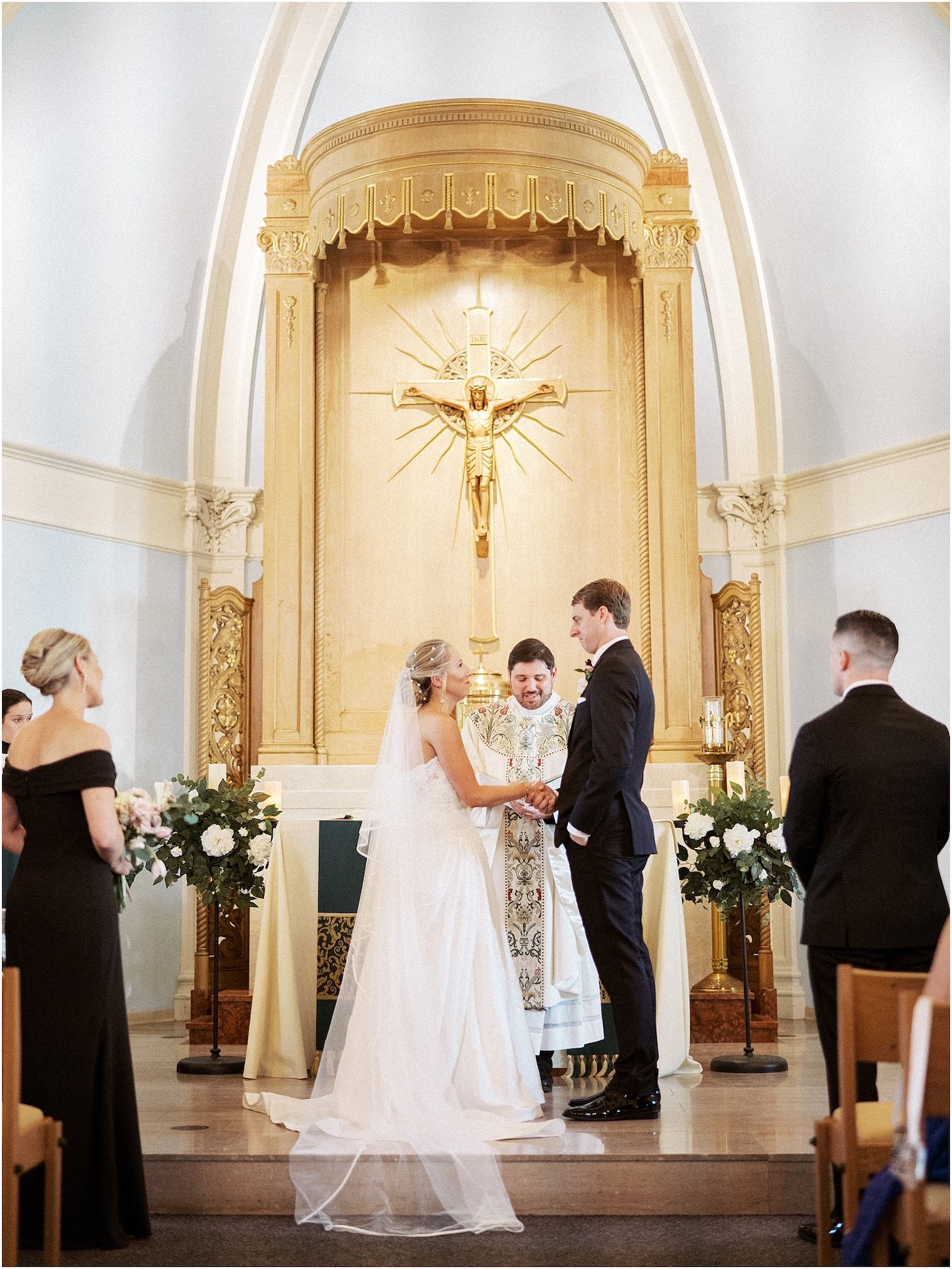 Bride and Groom Exchanging Vows during Religious Ceremony | Traditional Tampa Wedding Ceremony at Academy of Holy Names Chapel
