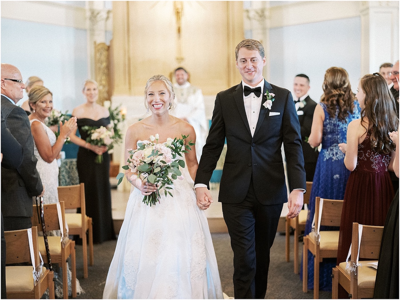 Bride and Groom Ceremony Aisle Exit | Traditional Tampa Wedding Ceremony at Academy of Holy Names Chapel