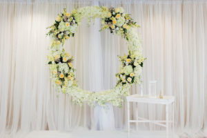 Romantic Classic White Hydrangeas, Roses, Yellow Florals in Circular Wreath | Tampa Bay Wedding Planner Special Moments Event Planning