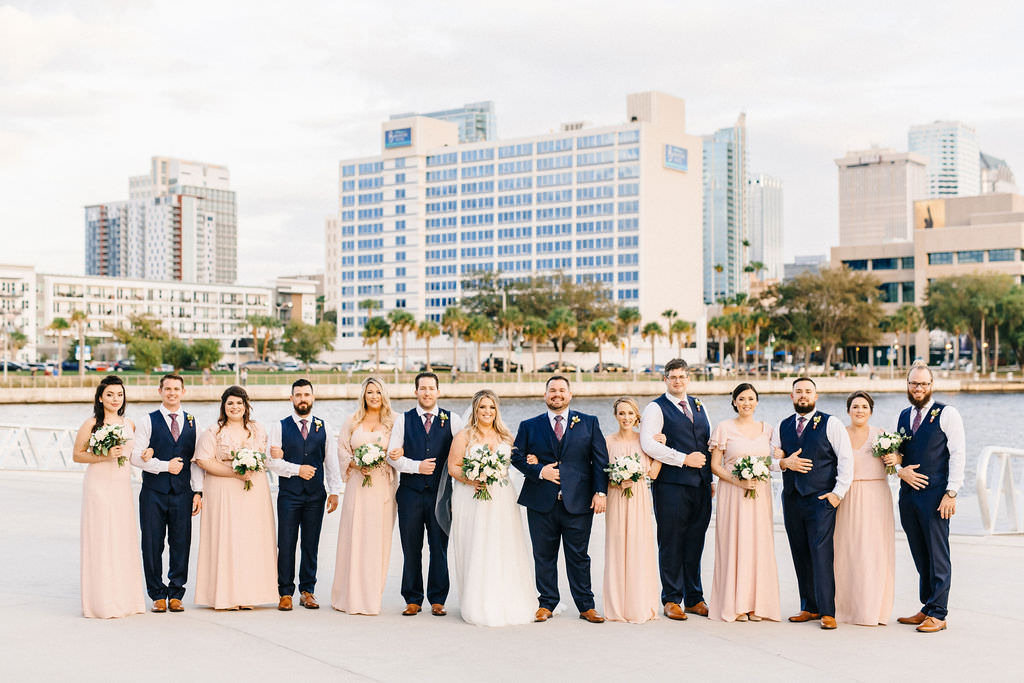 Florida Wedding Party with Downtown Tampa Backdrop, Bridesmaids in Mix and Match Blush Pink Show Me Your Mumu Bridesmaids Dresses | Tampa Bay Wedding Planner UNIQUE Weddings and Events