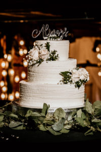 Vintage Inspired Three Tier White Buttercream Cake with Ivory Rose Floral Accents, Eucalyptus Greenery Garland, Always Cake Topper | Florida Wedding Photographer Bonnie Newman Creative