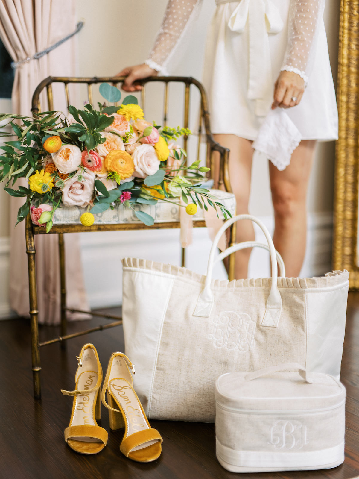 Elegant, Springtime Inspired Bridal Getting Ready Details, Monogram Bride Tote and Neutral Tone Makeup Bag, Mustard Open Toe Sam Edelman Yaro Block Heel Sandals, Romantic Bridal Bouquet with Vibrant Floral Stems, Pink Roses, Peach Carnations, Yellow Flowers, Soft Blue Accents | Florida Wedding Planner Kelly Kennedy Weddings and Events