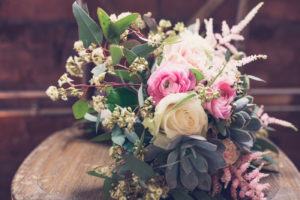 Bridal Wedding Bouquet with Dusty Rose Astilbe and Pink Ranunculus with White Roses and Succulents and Eucalyptus Greenery