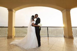 Romantic Sunset Bride and Groom Wedding Portrait on Terrace | Clearwater Beach Wedding Venue Duvall Ballroom Center