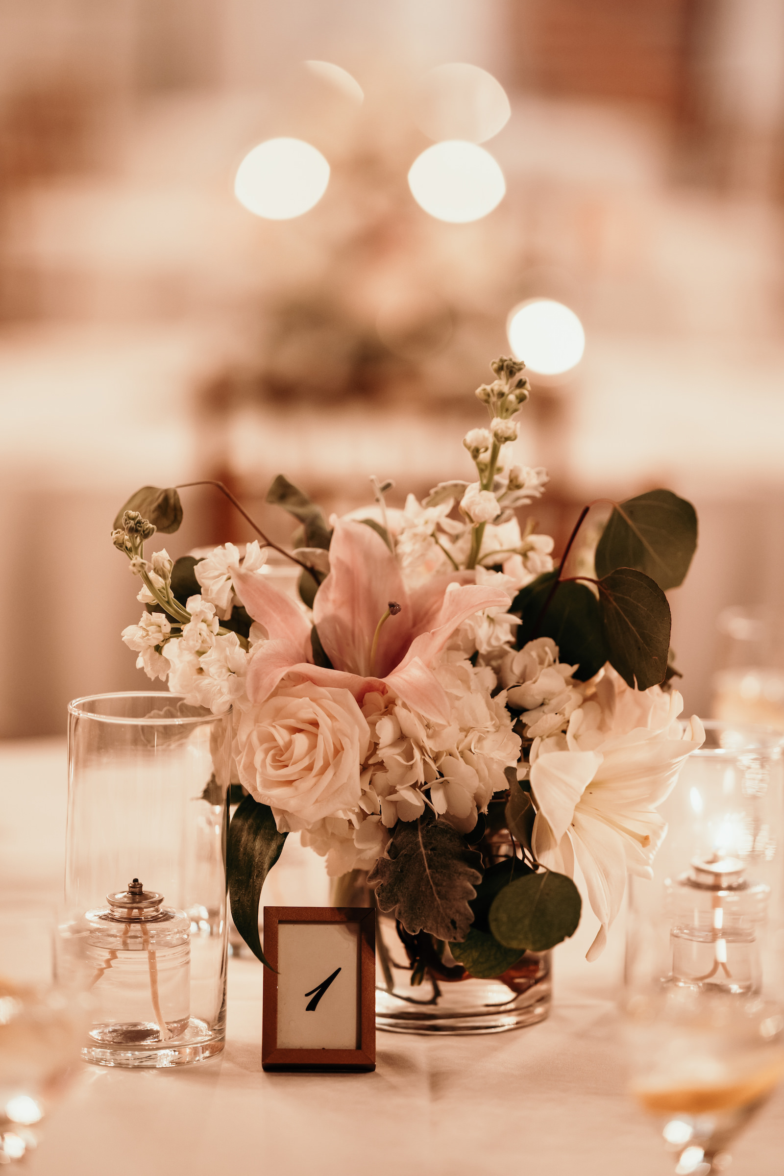 Elegant Wedding Reception Decor, Low Floral Centerpiece with Mixed Stems, White Roses, Blush Pink Flowers and Greenery Eucalyptus with Candlelight