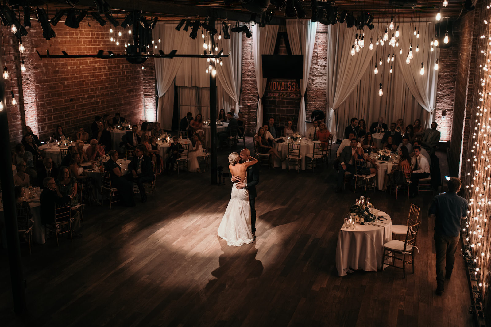 Downtown St. Petersburg Bride and Groom Share Romantic First Dance Wedding Reception Portrait | Historic Florida Wedding Venue NOVA 535